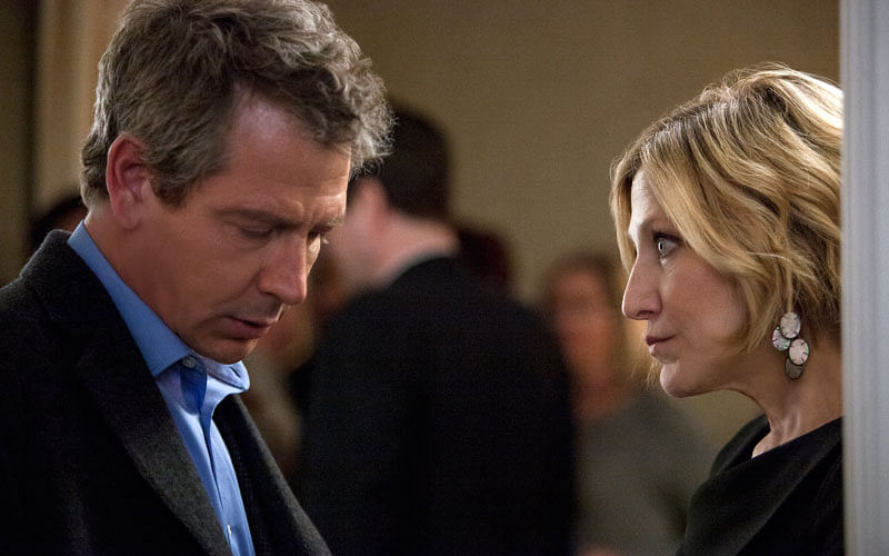 This image released by Netflix shows Ben Mendelsohn, left, and Edie Falco in a scene from `The Land of Steady Habits,` premiering on 14 September. Photo: AP
