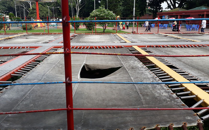 A torn bouncing pad for children at Zia Shishu Park, Dhaka. At least half of the mats of bouncing pads are in a bad shape. Galib Ashraf took this photo on 5 July.