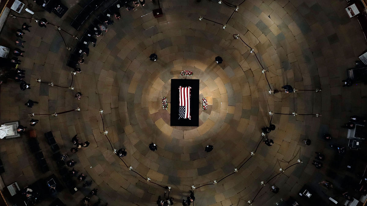 The late US senator John McCain, R-Ariz., lies in state in the US Capitol Rotunda on 31 August in Washington. Photo: AP