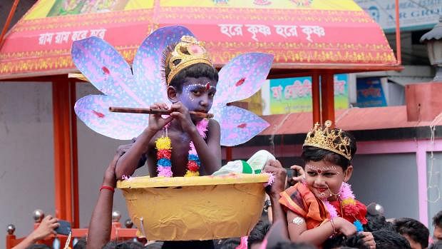 Two children dressed as Radha and Krishna at a rally commemorating the major Hindu deity Krishna’s birth. Abdul Hamid Road, Pabna, 2 September. Photo: Hasan Mahmud