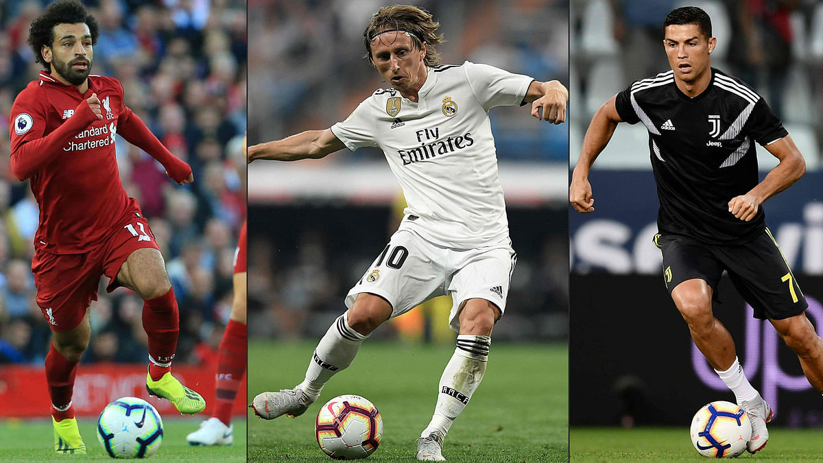This combination of pictures created shows (L-R) Liverpool`s Egyptian midfielder Mohamed Salah Real Madrid`s Croatian midfielder Luka Modric and Juventus` Portuguese forward Cristiano Ronaldo. Photo: AFP