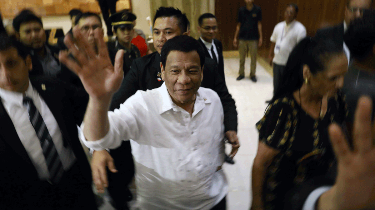 The president of the Philippines Rodrigo Roa Duterte (C) waves upon his arrival in Jerusalem at the start of an official visit to Israel, on 2 September. Photo: AFP