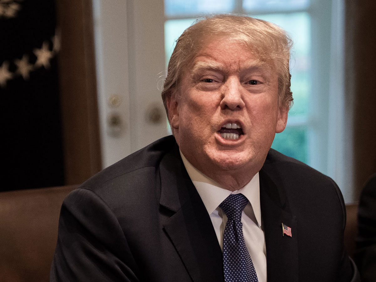 In this file photo taken on 9 April US president Donald Trump speaks during a meeting with senior military leaders at the White House in Washington, DC. Photo: AFP