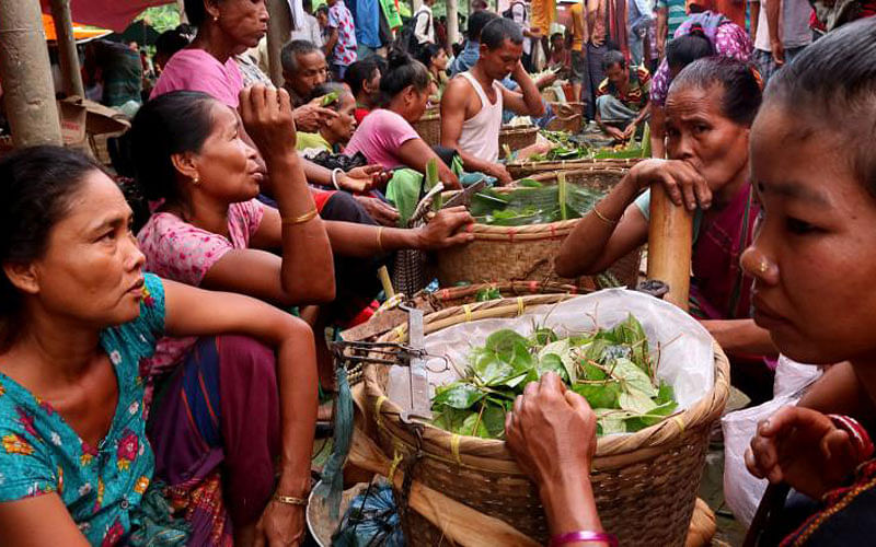 Indigenous people selling and buying sweet betel leaf. Ghilachhari, Naniarchar, Rangamati on 6 September. Photo: Supriya Chakma