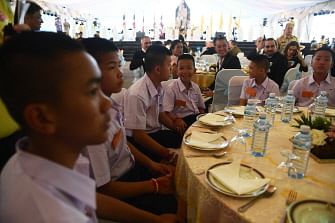 Members of the `Wild Boars` football club attend a reception in Bangkok on 6 September 2018. The young Thai football team whose terrifying ordeal in a flooded cave captivated the world earlier this year recounted their memories of their rescue on 6 September as they visited a spectacular exhibit chronicling the drama. Photo: AFP