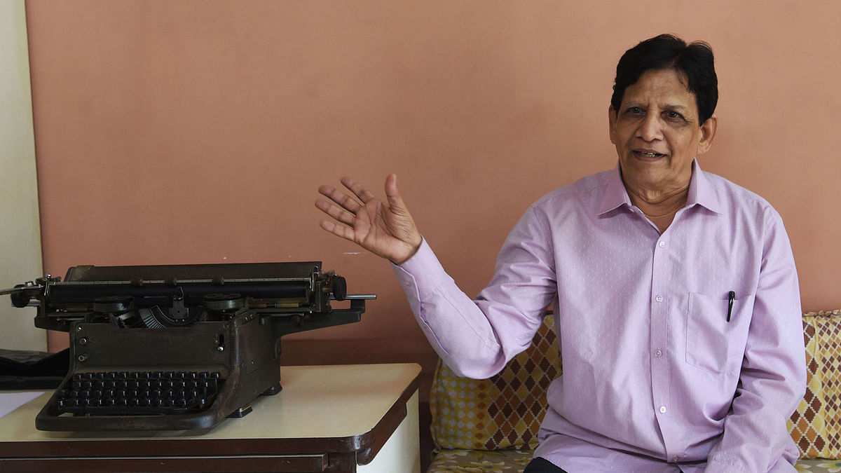 In this photograph taken on 17 July 2018, Indian artist Chandrakant Bhide who specialises in creating artwork using his typewriter, speaks during an interview with AFP in Mumbai. Photo: AFP