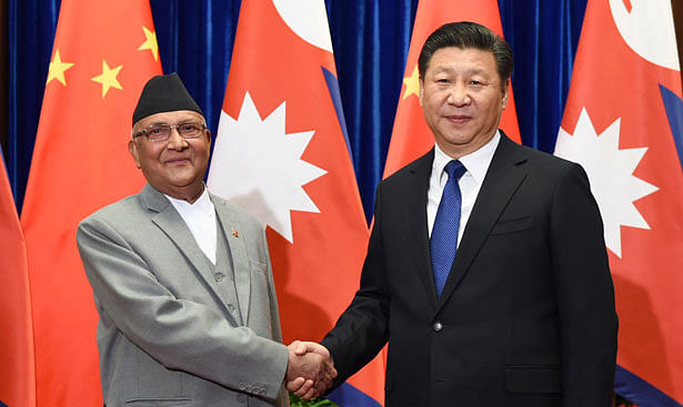 Chinese president Xi Jinping and Nepalese prime minister Khadga Prasad Oli. AFP File Photo