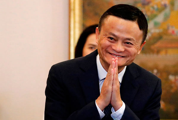 In this file photo taken on 18 April Alibaba founder Jack Ma gestures as he arrives for a meeting with Thailand’s prime minister Prayuth Chan-ocha in Bangkok during a visit to the country to announce the group’s investment in the Thai government’s Eastern Economic Corridor (EEC) scheme. Photo: AFP