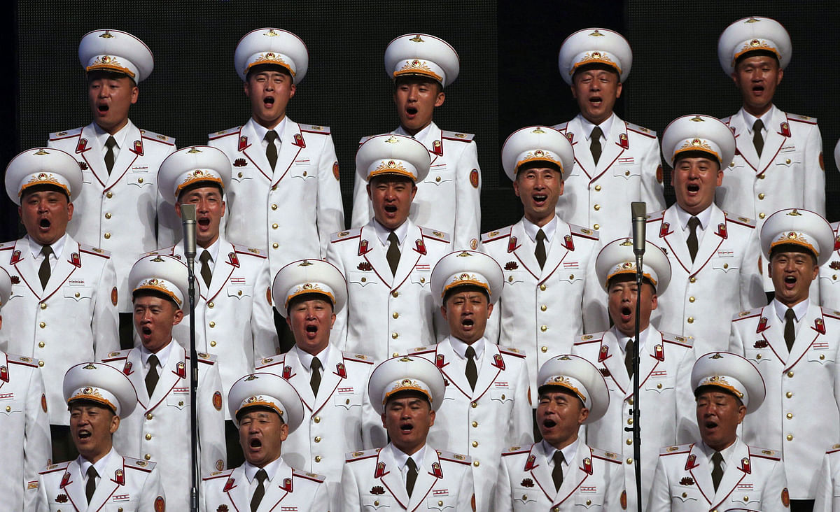 Soldiers sing during a concert on the eve of 70th anniversary of North Korea’s foundation in Pyongyang on 8 September. Photo: Reuters