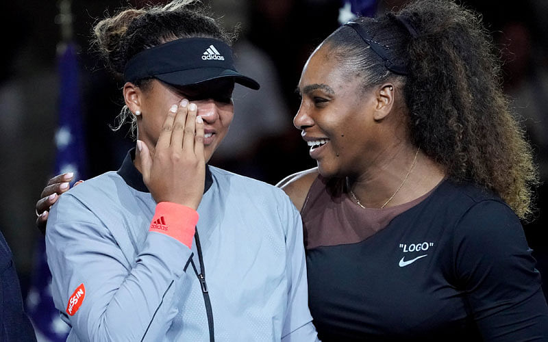 Naomi Osaka of Japan (left) cries as Serena Williams of the USA comforts her after the crowd booed during the trophy ceremony following the women’s final on day thirteen of the 2018 US Open tennis tournament at USTA Billie Jean King National Tennis Centre. Photo: Reuters