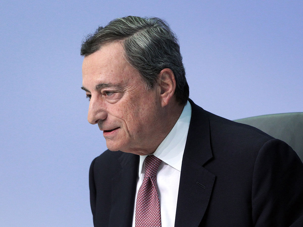 Mario Draghi, president of the European Central Bank (ECB), addresses the media during a press conference following the meeting of the Governing Council in Frankfurt am Main, Germany, on September 13, 2018. European Central Bank chief Mario Draghi played down risks to the eurozone economy in the face of rising `uncertainties`, as the bank stuck to its plan to scale back stimulus this year. AFP