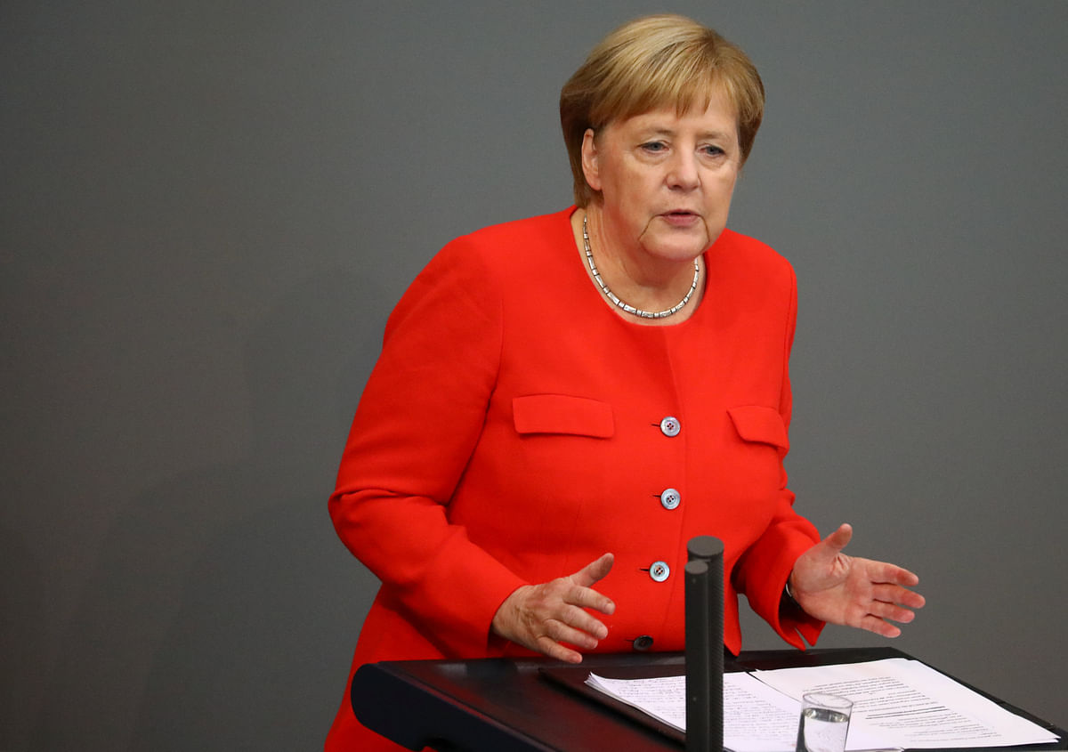 German Chancellor Angela Merkel speaks during a session at the lower house of parliament Bundestag in Berlin, Germany, 12 September 2018. Photo: Reuters