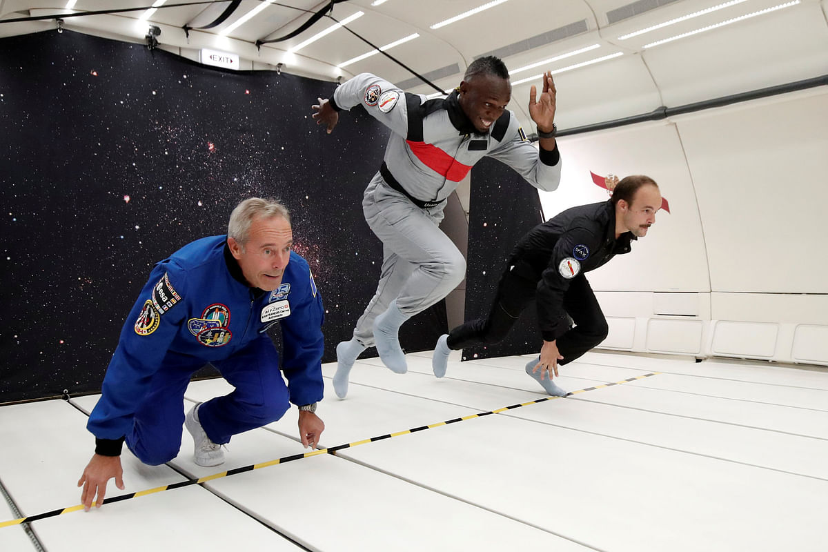 Retired sprinter Usain Bolt, French astronaut Jean-Francois Clervoy and French Interior designer Octave de Gaulle enjoy zero gravity conditions during a flight in a specially modified plane above Reims. Photo: Reuters