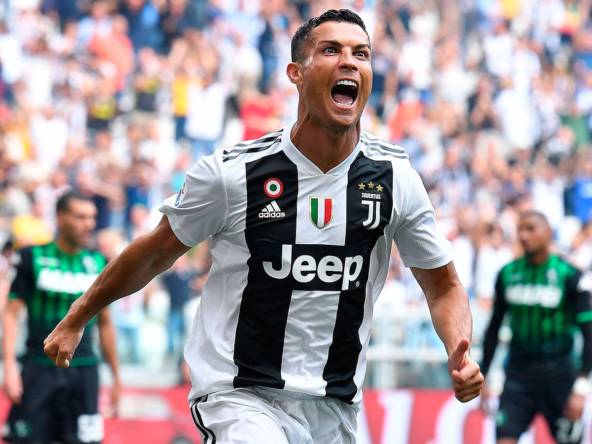 Juventus` Cristiano Ronaldo celebrates after scoring during a Serie A soccer match between Juventus and Sassuolo, at the Allianz Stadium in Turin, Italy, Sunday, 16 September 2018. Photo: AP