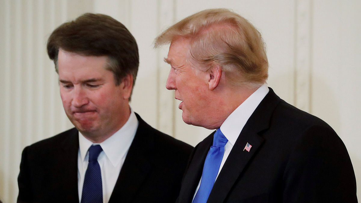 US president Donald Trump talks with his nominee for the US Supreme Court Brett Kavanaugh at his nomination announcement in the East Room of the White House in Washington on 9 July. Photo: Reuters