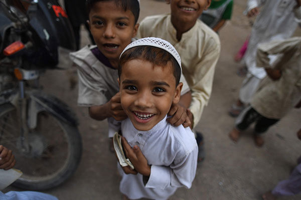 Children of Bangalee immigrants living in Pakistan look on at a madrasa in Karachi on 17 September, 2018. Photo: AFP