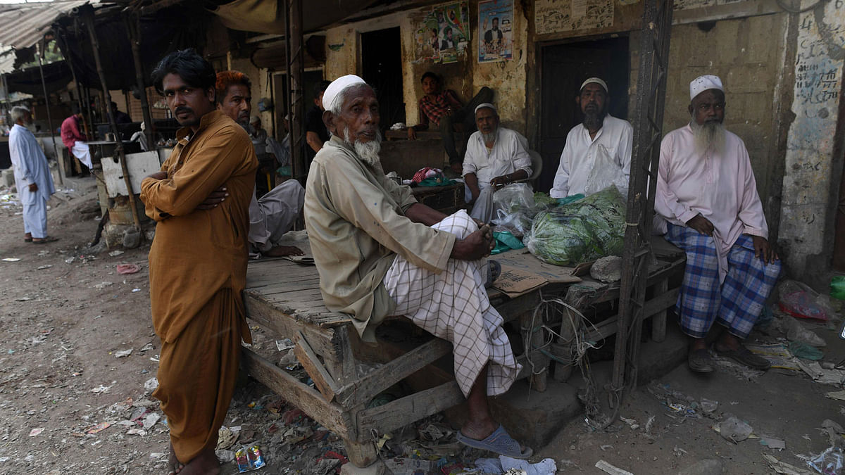 Bangalee immigrants living in Pakistan gather at a market in Karachi on 17 September, 2018. Photo: AFP