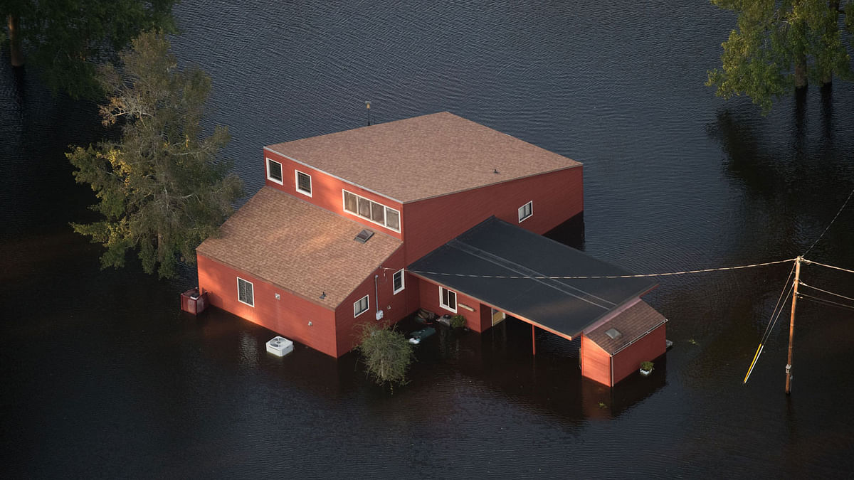 A home is surrounded by floodwaters from Hurricane Florence on 17 September 2018 in Conway, South Carolina. Photo: AFP