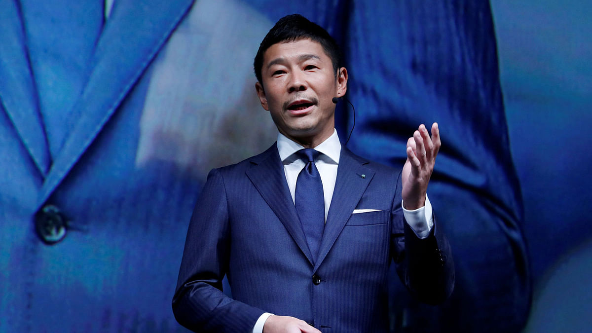 Yusaku Maezawa, the chief executive of Zozo, which operates Japan`s popular fashion shopping site Zozotown and is officially called Start Today Co, speaks at an event launching the debut of its formal apparel items, in Tokyo, Japan, 3 July, 2018. Photo: Reuters