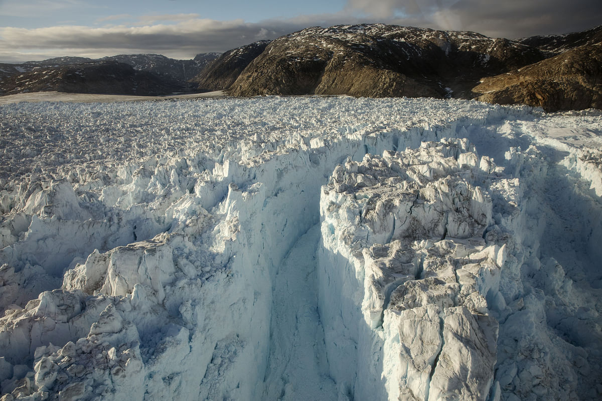 A large crevasse forms near the calving front of the Helheim glacier near Tasiilaq, Greenland, on 19 June 2018. Photo: Reuters