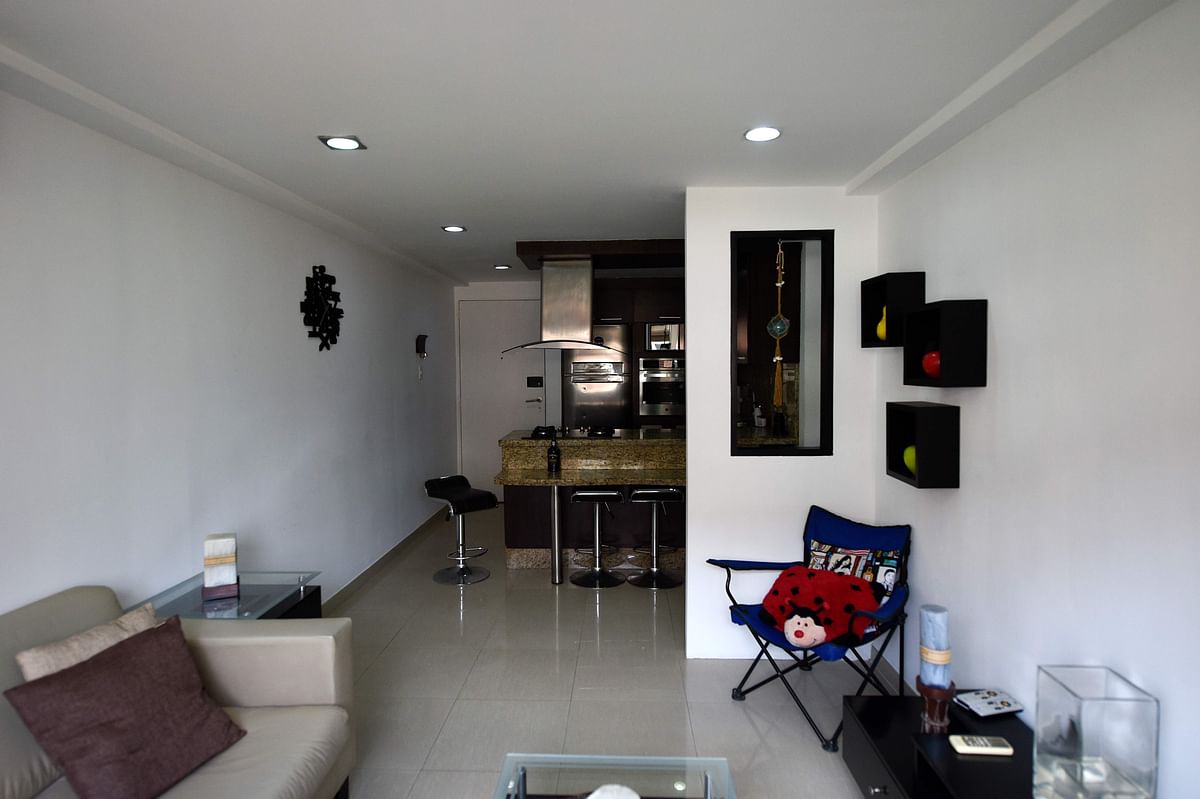 View of the living room of an empty apartment in Caracas, Venezuela on 4 September 2018. Photo: AFP