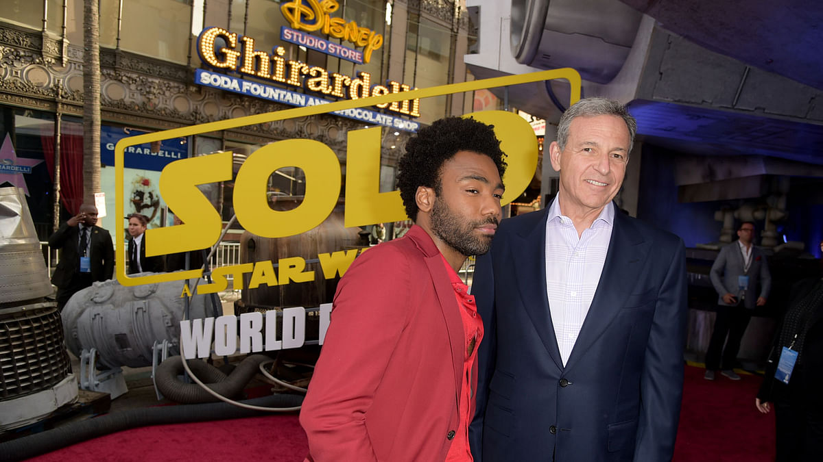 In this file photo taken on 10 May 2018 Donald Glover and Bob Iger, chief executive officer of Disney attend the premiere of Disney Pictures and Lucasfilm’s “Solo: A Star Wars Story” at the El Capitan Theatre in Hollywood, California. Photo: AFP