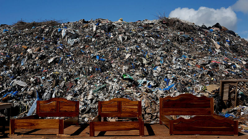 Wooden beds are displayed next to a dump in Bamako, Mali, on 24 August 2018. Photo: Reuters