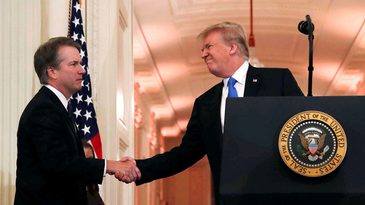 US president Donald Trump introduces his Supreme Court nominee judge Brett Kavanaugh (L) in the East Room at the White House in Washington, US on 9 July. Photo: AFP