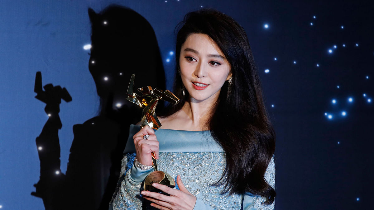In this 21 March, 2017, file photo, Chinese actress Fan Bingbing poses after winning the Best Actress Award of the Asian Film Awards in Hong Kong. Photo: AP