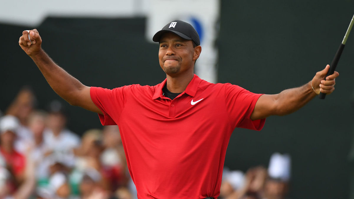 Tiger Woods reacts to win the Tour Championship golf tournament at East Lake Golf Club. Photo: Reuters