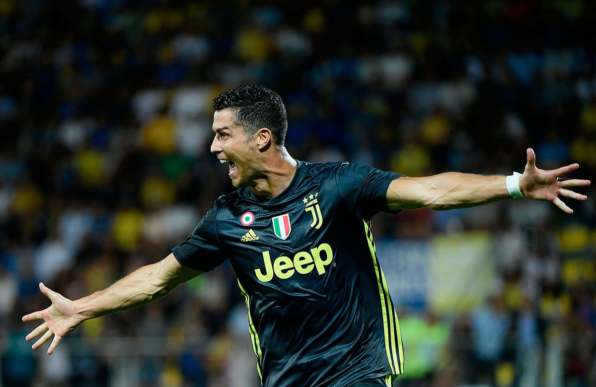 Juventus` Portuguese forward Cristiano Ronaldo celebrates after he scored during the Italian Serie A football match between Frosinone and Juventus Turin on 23 September 2018 at the Benito-Stirpe Stadium in Frosinone. Photo: AFP