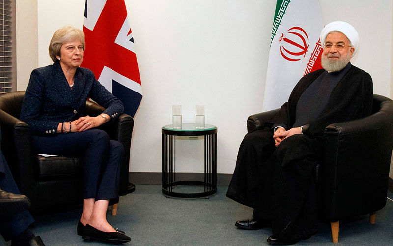 British prime minister Theresa May (L) meets with Iranian President Hassan Rouhani on the sidelines of the 73rd session of the United Nations General Assembly, at the United Nations headquarters in New York City on 25 September. Photo: AFP