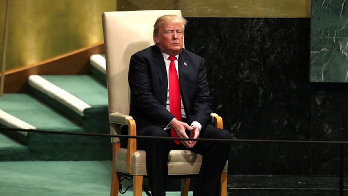 US president Donald Trump sits in the chair reserved for heads of state before delivering his address during the 73rd session of the United Nations General Assembly at UN headquarters in New York, US, 25 September 2018. Photo: Reuters