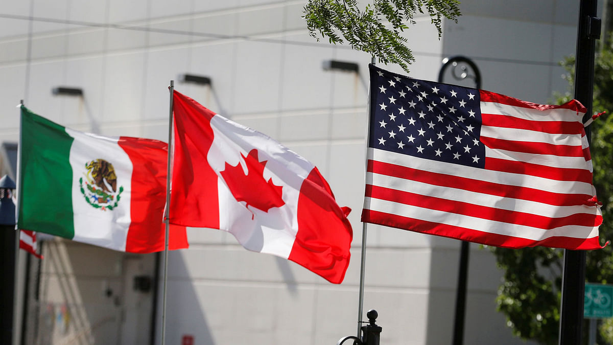 Flags of the US, Canada and Mexico fly next to each other in Detroit, Michigan, US on 29 August. Photo: Reuters