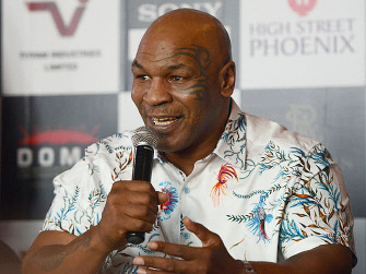 Former US boxer Mike Tyson speaks during a news conference to announce India`s first global mixed martial arts Kumite 1 league in Mumbai on 28 September 2018. Photo: AFP
