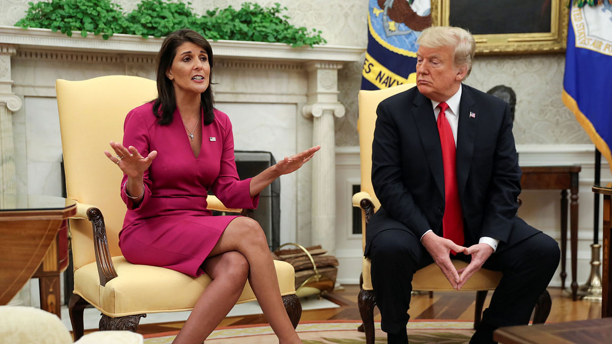 US president Donald Trump greets UN Ambassador Nikki Haley in the Oval Office of the White House as the president accepted the Haley`s resignation in Washington, US, on 9 October 2018. Photo: Reuters