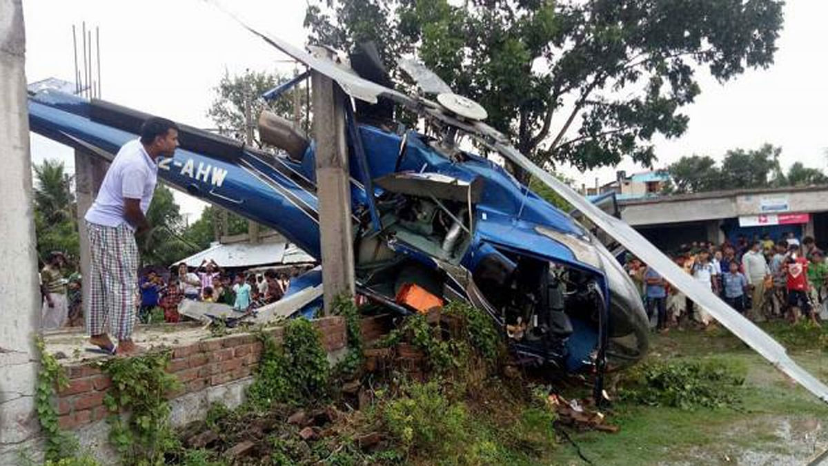 The helicopter carrying Channel I managing director Faridur Reza and 5 others crashed in Godagari uapzila of Rajshahi on Thursday afternoon. Photo: collected.