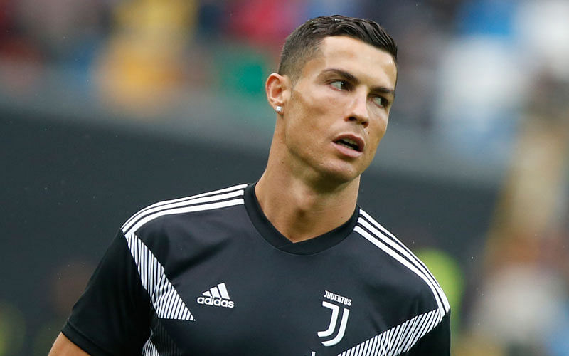 Juventus forward Cristiano Ronaldo warms up prior to the Serie A soccer match between Udinese and Juventus, at the Dacia Arena stadium in Udine, Italy, Saturday, Oct.6, 2018. Cristiano Ronaldo is back in Juventus’ starting lineup, a week after a Nevada woman filed a civil lawsuit accusing him of rape nine years ago. Photo: AP