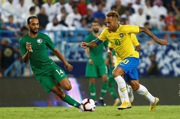 Brazil`s Neymar in action with Saudi Arabia`s Abdullah Otayf in an International Friendly at King Saud University Stadium, Riyadh, Saudi Arabia on 12 October 2018. Photo: Reuters