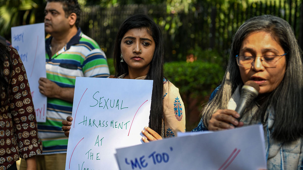 Indian journalists hold placards at a protest against sexual harassment in the media industry in New Delhi on 13 October 2018. India`s #MeToo movement has engulfed Bollywood figures, a government minister and several comedians and top journalists. Photo: AFP