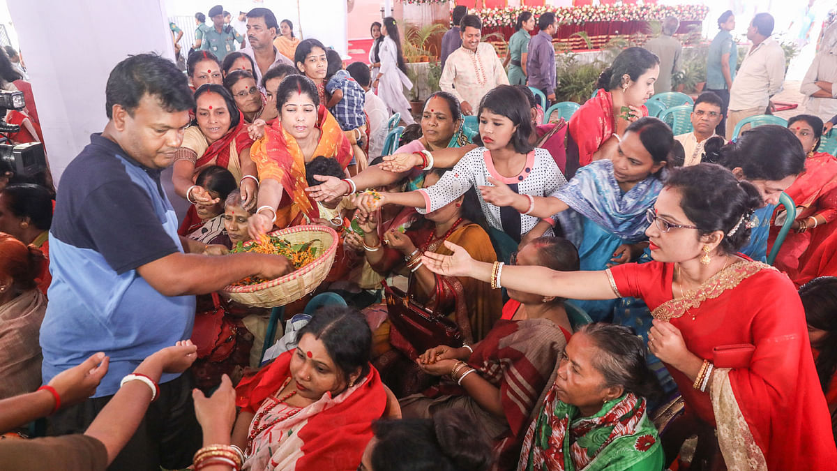 Flowers and bel leaves distributed among devotees for using as offerings.