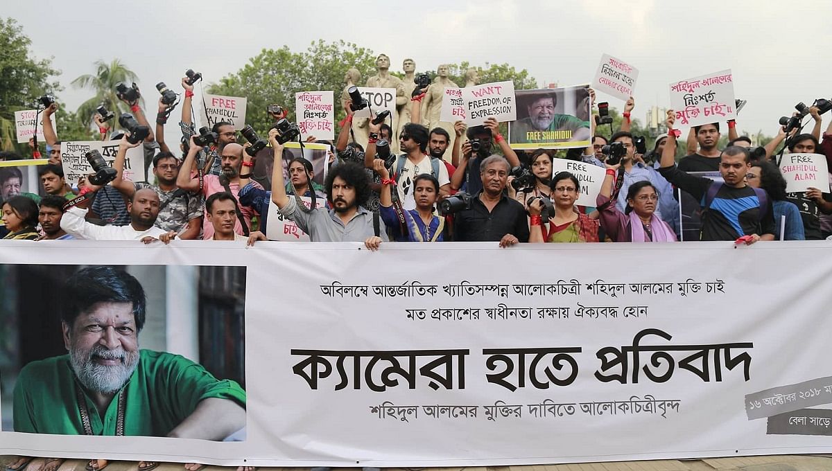 Photographers stage demonstration on Tuesday seeking unconditional release of arrested photographer Shahidul Alam. Photo: UNB