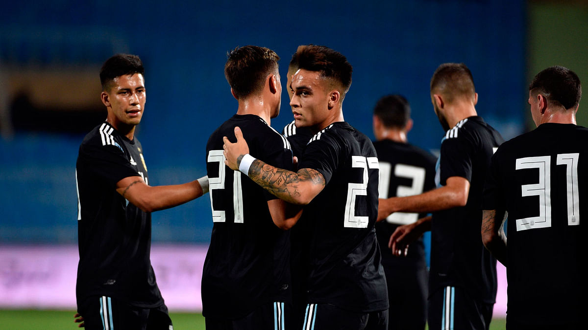 Argentina`s Lautaro Martinez (C) celebrates his goal with teammates during a friendly football match between Argentina and Iraq at the Faisal bin Fahd Stadium in Riyadh on 11 October 2018. Photo: AFP