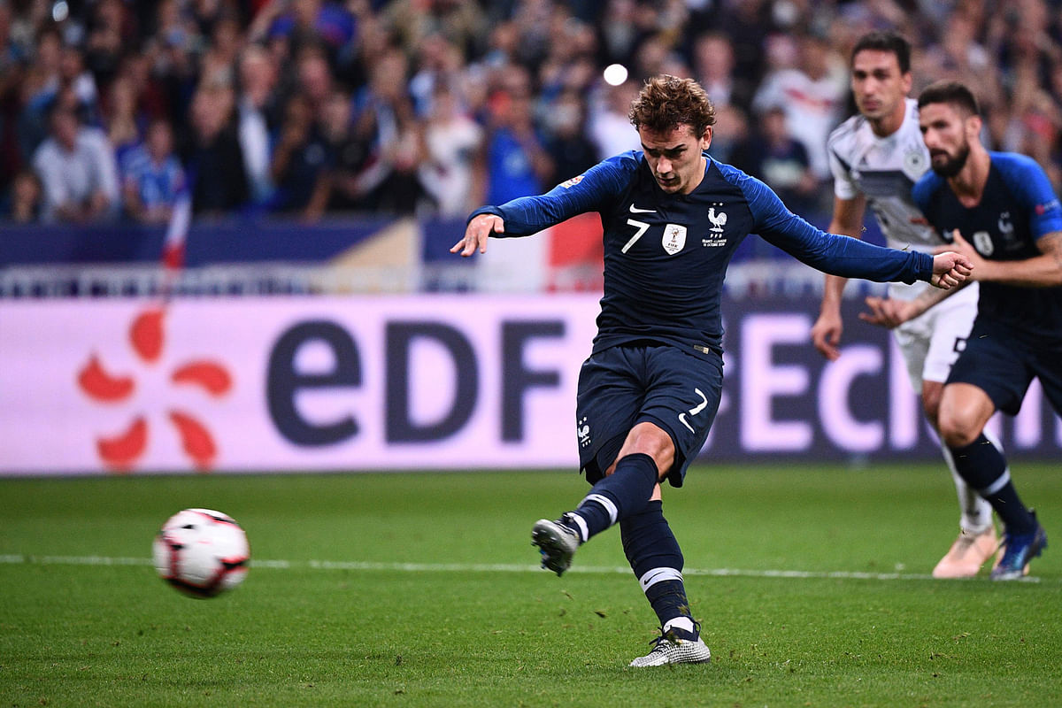 France`s forward Antoine Griezmann kicks to score their second goal on a penalty kick during the UEFA Nations League football match between France and Germany at the Stade de France in Saint-Denis, near Paris on 16 October 2018. Photo: AFP