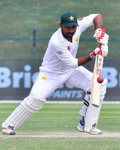 Pakistan cricketer Sarfraz Ahmed plays a shot during day three of the second Test cricket match in the series between Australia and Pakistan at the Abu Dhabi Cricket Stadium in Abu Dhabi on 18 October , 2018. Photo: AFP