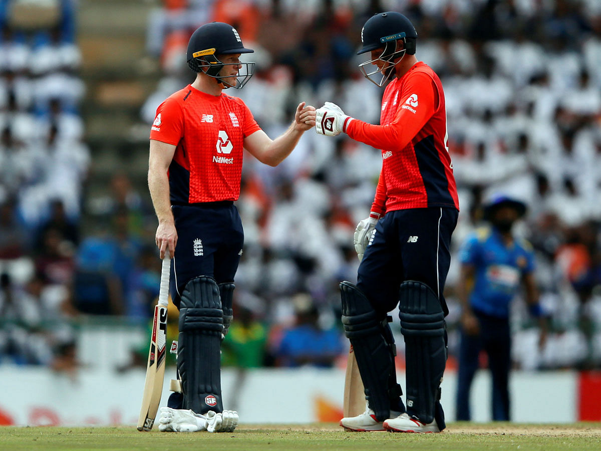 England`s captain Eoin Morgan (L) and his teammate Joe Root during Sri Lanka match in Pallekele, Sri Lanka on 20 October, 2018. Photo: Reuters