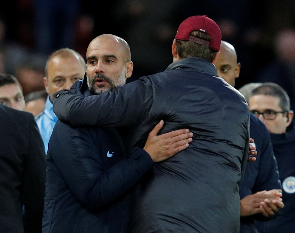 Manchester City manager Pep Guardiola shakes hands with Liverpool manager Juergen Klopp after the match on 7 October 2018. Photo: Reuters