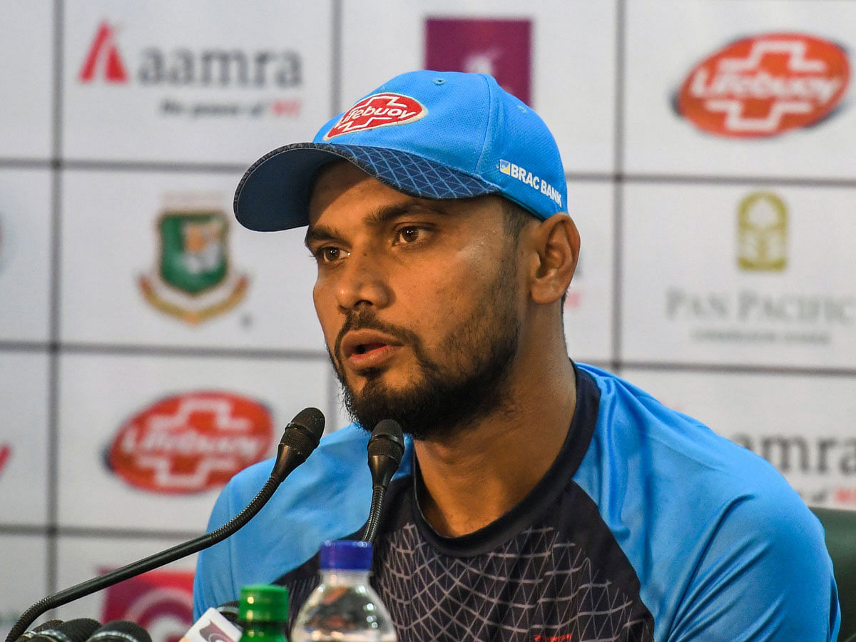 Captain Mashrafe Bin Mortaza speaks during a press conference ahead of the first one day international (ODI) cricket match between Bangladesh and Zimbabwe at the Sher-e-Bangla National Cricket Stadium in Dhaka on 20 October, 2018. Photo: AFP