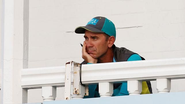 Australia coach Justin Langer watches the third One Day International match against England at Trent Bridge, Nottingham, Britain on 19 June 2018. Reuters File Photo