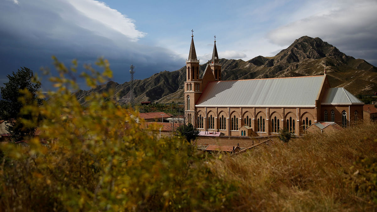 An underground Catholic church overlooks the village of Huangtugang. Photo: Reuters